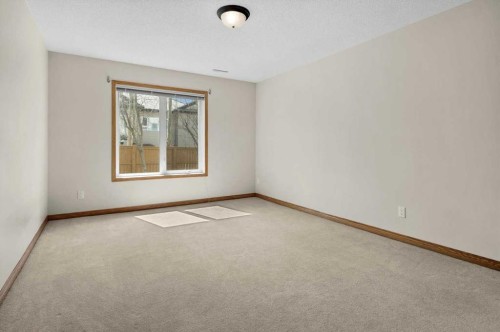122 Rocky Ridge Villas Nw, Calgary, AB - Indoor Photo Showing Other Room