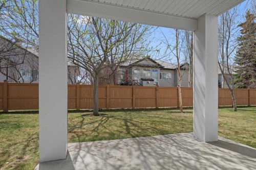 122 Rocky Ridge Villas Nw, Calgary, AB - Outdoor