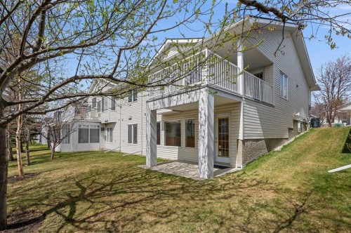 122 Rocky Ridge Villas Nw, Calgary, AB - Outdoor