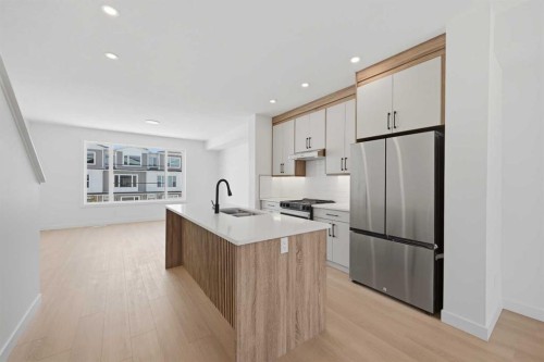 8814 48 Street Ne, Calgary, AB - Indoor Photo Showing Kitchen With Stainless Steel Kitchen With Double Sink With Upgraded Kitchen