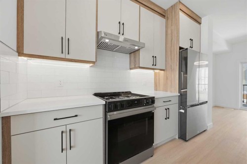 8814 48 Street Ne, Calgary, AB - Indoor Photo Showing Kitchen With Stainless Steel Kitchen With Upgraded Kitchen