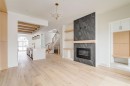 2447 29 Sw, Calgary, AB  - Indoor Photo Showing Living Room With Fireplace 