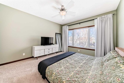 123 Parkmere Court, Chestermere, AB - Indoor Photo Showing Bedroom