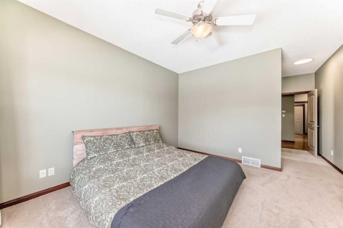 123 Parkmere Court, Chestermere, AB - Indoor Photo Showing Bedroom