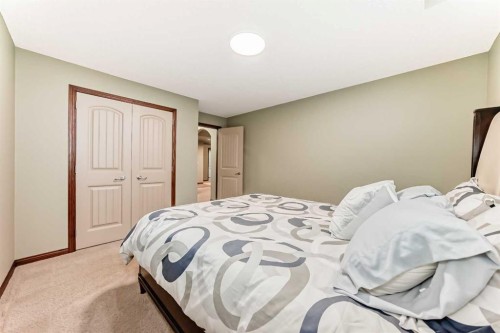 123 Parkmere Court, Chestermere, AB - Indoor Photo Showing Bedroom