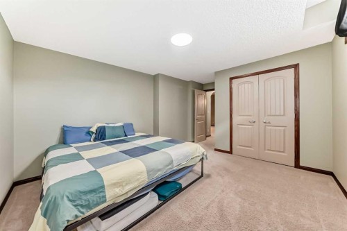 123 Parkmere Court, Chestermere, AB - Indoor Photo Showing Bedroom