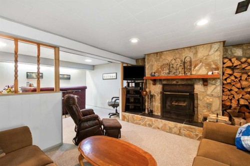 4417 55 Avenue, Olds, AB - Indoor With Fireplace