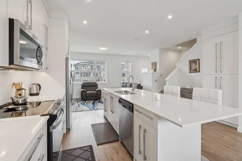 226 Dawson Way, Chestermere, AB - Indoor Photo Showing Kitchen With Double Sink With Upgraded Kitchen