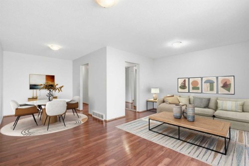 3405 35 Avenue Se, Calgary, AB - Indoor Photo Showing Living Room