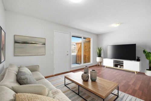 3405 35 Avenue Se, Calgary, AB - Indoor Photo Showing Living Room