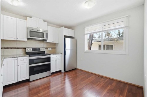 3405 35 Avenue Se, Calgary, AB - Indoor Photo Showing Kitchen With Stainless Steel Kitchen