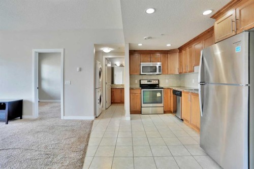 13-330 2Nd Street West, Brooks, AB - Indoor Photo Showing Kitchen With Stainless Steel Kitchen