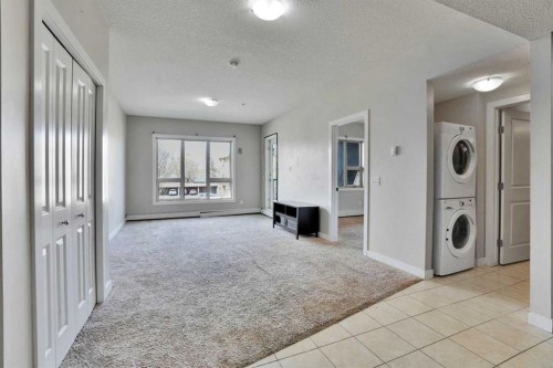 13-330 2Nd Street West, Brooks, AB - Indoor Photo Showing Laundry Room