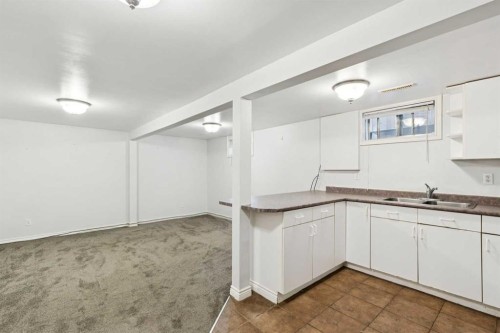 7615 36 Avenue Nw, Calgary, AB - Indoor Photo Showing Kitchen With Double Sink