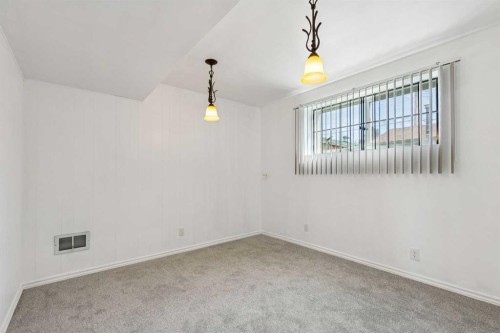 12 Huntwick Way Ne, Calgary, AB - Indoor Photo Showing Other Room