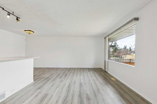 12 Huntwick Way Ne, Calgary, AB - Indoor Photo Showing Other Room
