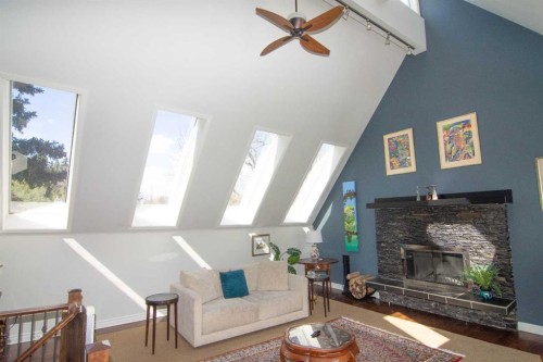 1616 Summer Street Sw, Calgary, AB - Indoor Photo Showing Living Room With Fireplace