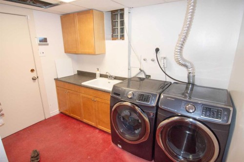 1616 Summer Street Sw, Calgary, AB - Indoor Photo Showing Laundry Room