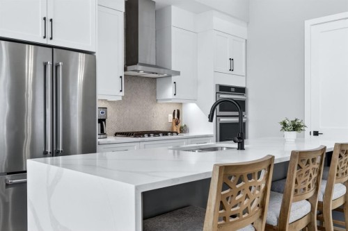 46 Crestridge Bay Sw, Calgary, AB - Indoor Photo Showing Kitchen With Upgraded Kitchen