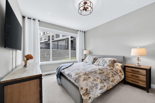 46 Crestridge Bay Sw, Calgary, AB - Indoor Photo Showing Bedroom