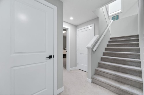 46 Crestridge Bay Sw, Calgary, AB - Indoor Photo Showing Other Room