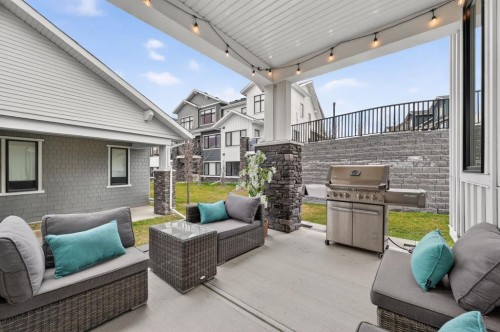 46 Crestridge Bay Sw, Calgary, AB - Outdoor With Deck Patio Veranda With Exterior