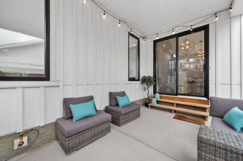 46 Crestridge Bay Sw, Calgary, AB - Outdoor With Deck Patio Veranda With Exterior