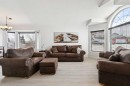 438 Sheep River Point, Okotoks, AB  - Indoor Photo Showing Living Room 