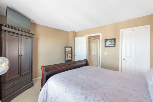 122 Bridlewood Lane Sw, Calgary, AB - Indoor Photo Showing Bedroom