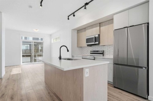 32 Walgrove Common Se, Calgary, AB - Indoor Photo Showing Kitchen With Upgraded Kitchen