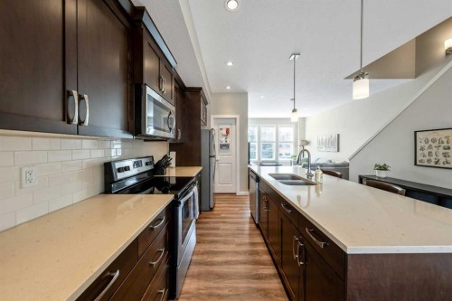 1391 Legacy Circle Se, Calgary, AB - Indoor Photo Showing Kitchen With Double Sink With Upgraded Kitchen