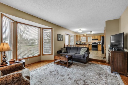 26 Tiller Place Se, Airdrie, AB - Indoor Photo Showing Living Room