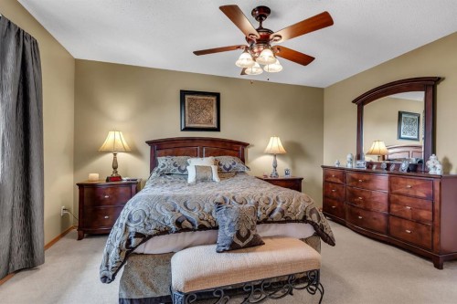 26 Tiller Place Se, Airdrie, AB - Indoor Photo Showing Bedroom