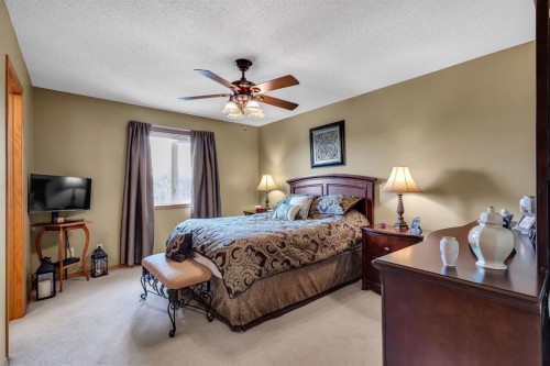 26 Tiller Place Se, Airdrie, AB - Indoor Photo Showing Bedroom