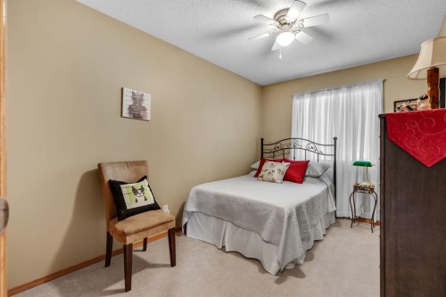 26 Tiller Place Se, Airdrie, AB - Indoor Photo Showing Bedroom