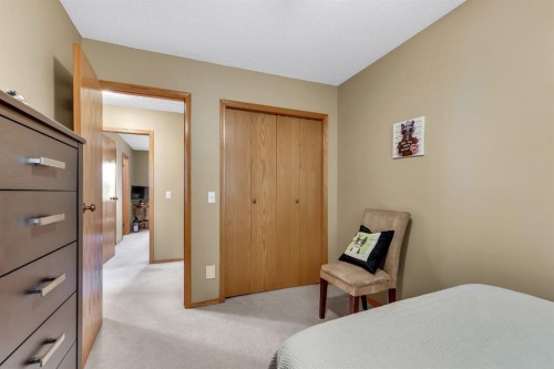 26 Tiller Place Se, Airdrie, AB - Indoor Photo Showing Bedroom