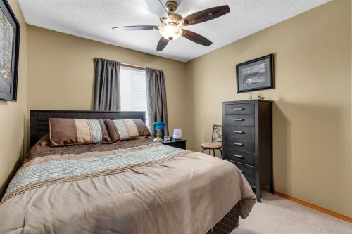 26 Tiller Place Se, Airdrie, AB - Indoor Photo Showing Bedroom