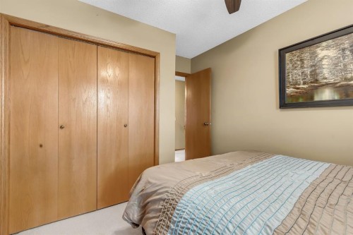 26 Tiller Place Se, Airdrie, AB - Indoor Photo Showing Bedroom