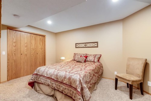 26 Tiller Place Se, Airdrie, AB - Indoor Photo Showing Bedroom
