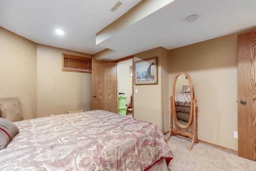 26 Tiller Place Se, Airdrie, AB - Indoor Photo Showing Bedroom