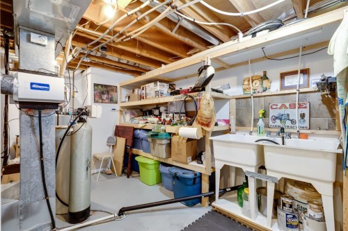 26 Tiller Place Se, Airdrie, AB - Indoor Photo Showing Basement