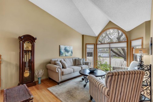 26 Tiller Place Se, Airdrie, AB - Indoor Photo Showing Living Room