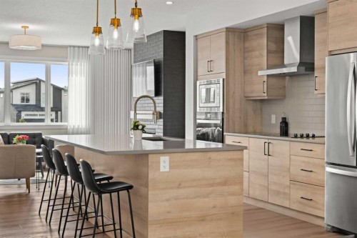 229 Precedence View, Cochrane, AB - Indoor Photo Showing Kitchen With Upgraded Kitchen