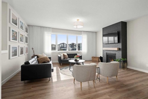 229 Precedence View, Cochrane, AB - Indoor Photo Showing Living Room With Fireplace