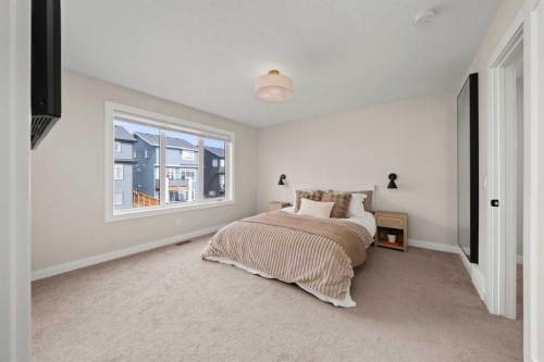 229 Precedence View, Cochrane, AB - Indoor Photo Showing Bedroom