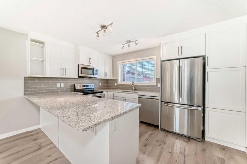 393 Legacy Boulevard Se, Calgary, AB - Indoor Photo Showing Kitchen With Stainless Steel Kitchen With Upgraded Kitchen