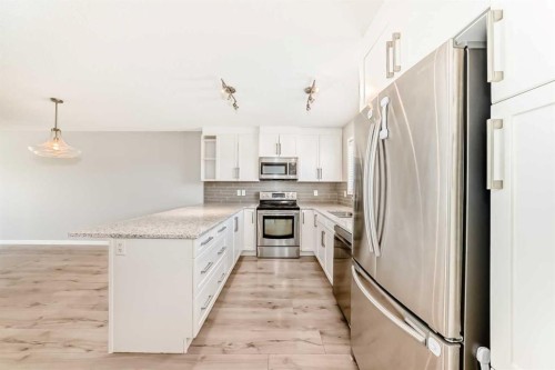 393 Legacy Boulevard Se, Calgary, AB - Indoor Photo Showing Kitchen With Stainless Steel Kitchen With Upgraded Kitchen
