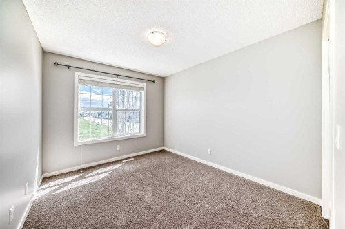 393 Legacy Boulevard Se, Calgary, AB - Indoor Photo Showing Other Room