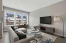 54 Legacy Close Se, Calgary, AB  - Indoor Photo Showing Living Room 