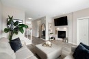 170 Seton Grove Se, Calgary, AB  - Indoor Photo Showing Living Room With Fireplace 
